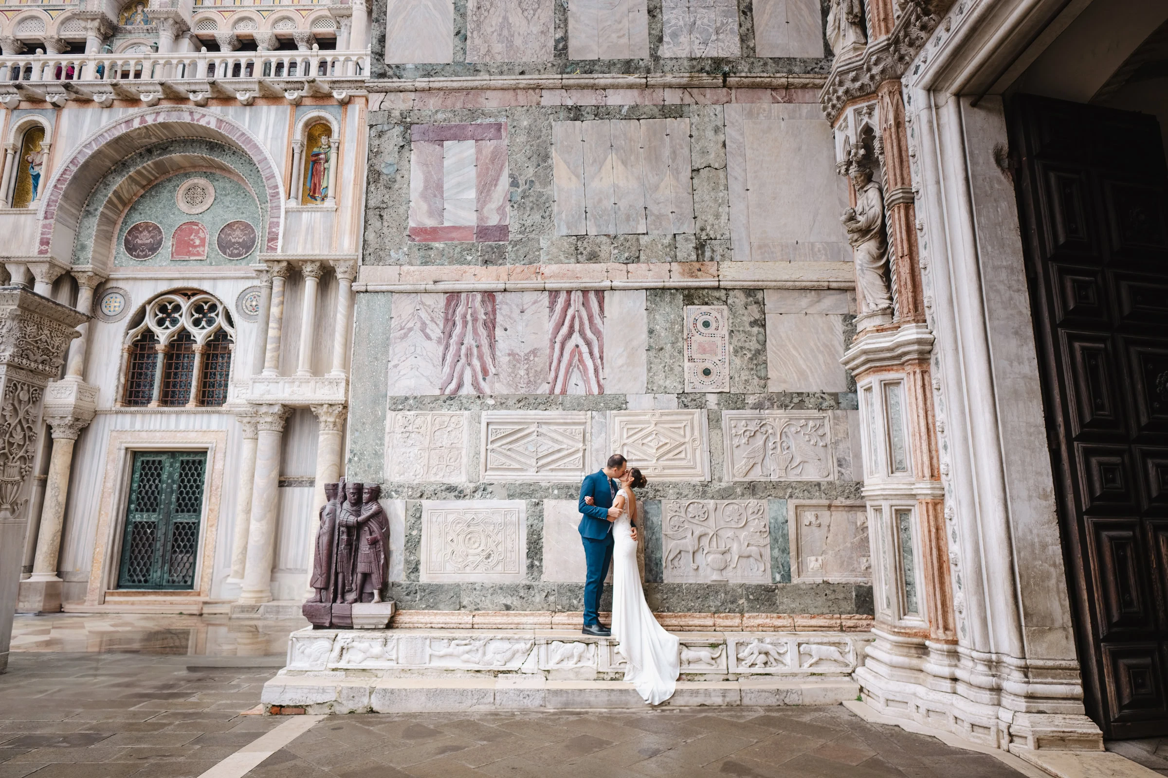 elopement photography in Venice against a historic stone facade