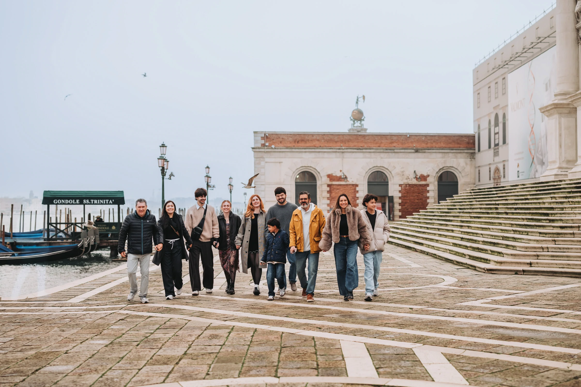 Parents and children enjoying open space near Santa Maria della Salute during photoshoot