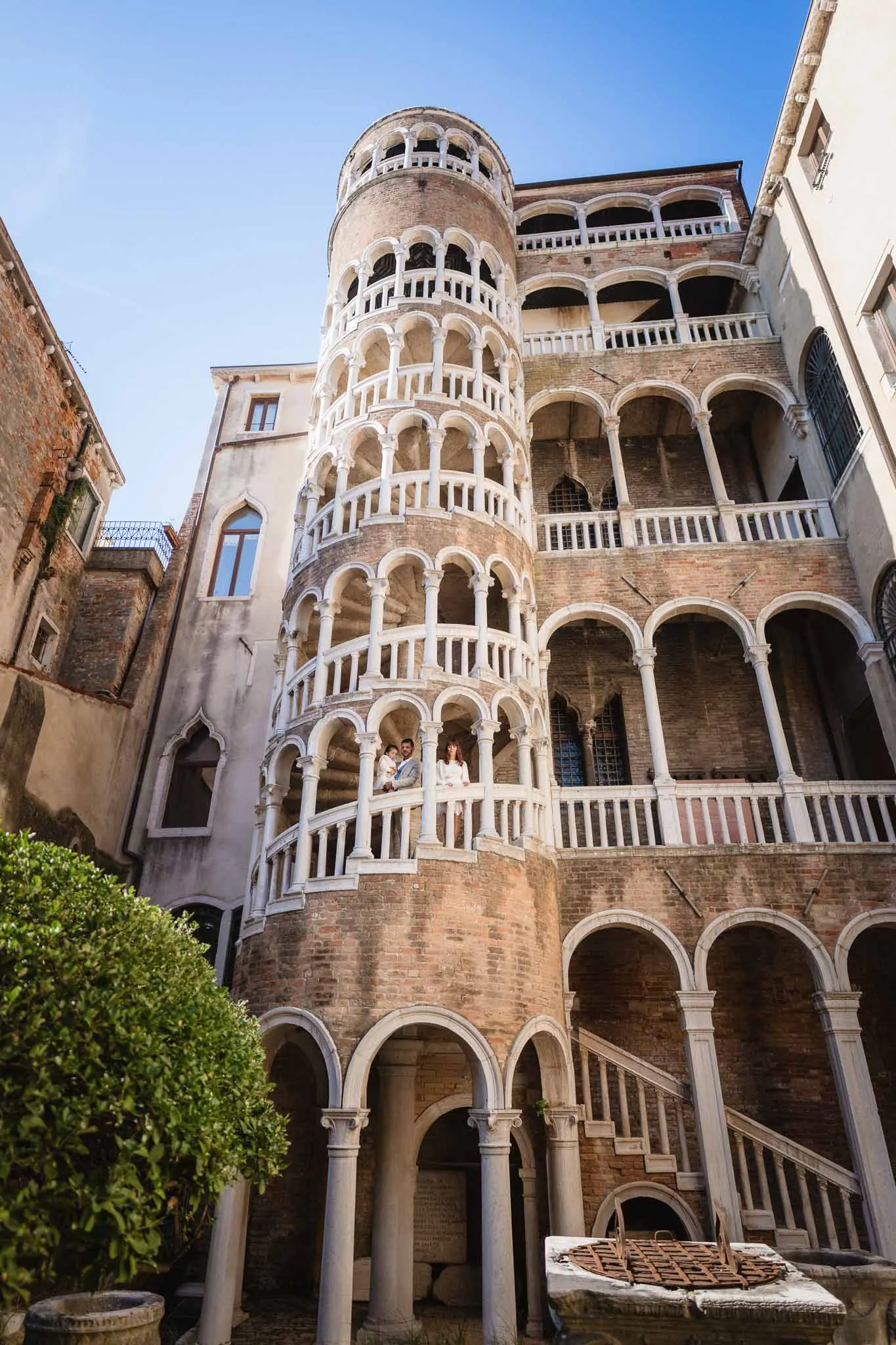 Family portrait near Contarini del Bovolo staircase in Venice