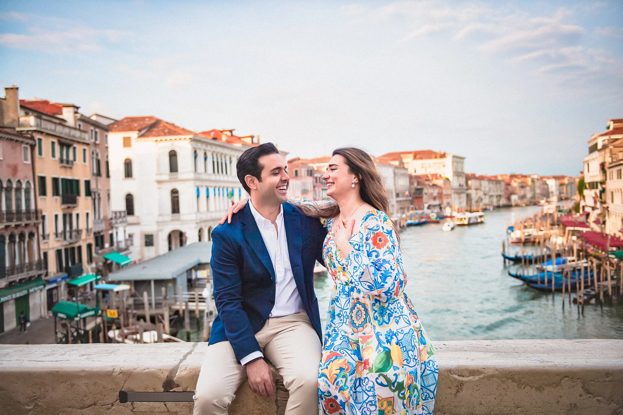 Romantic Venice couple portrait during sunset in front of Grand Canal.