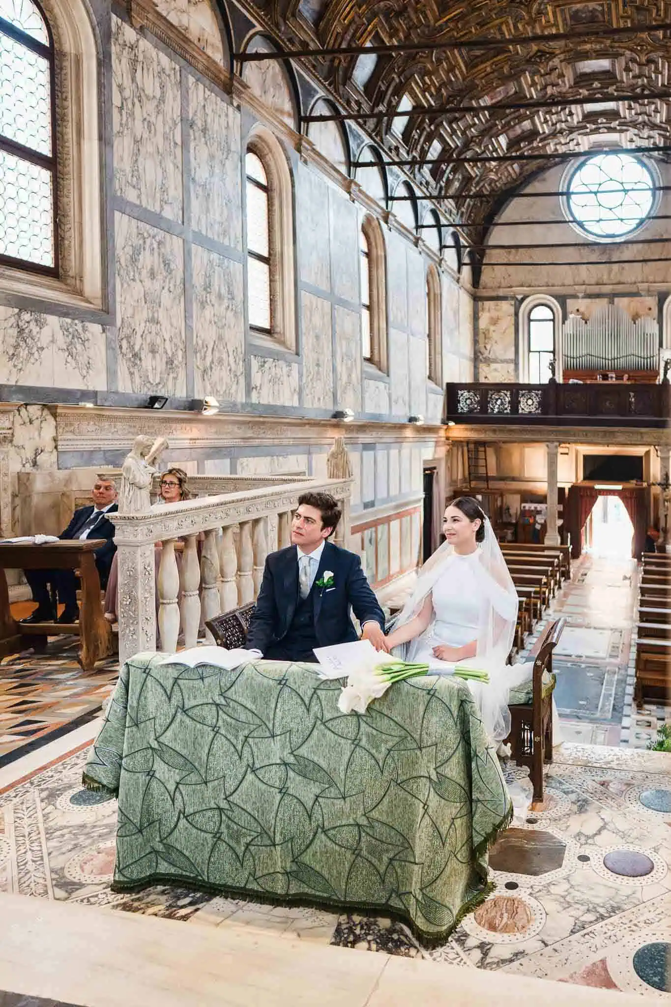 Elegant Venice church wedding ceremony with bride and groom, capturing romantic vows.