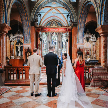 Venice church, Catholic wedding ceremony with bride and groom exchanging vows.