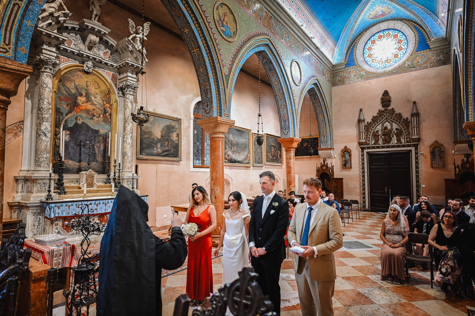 Venice church Catholic wedding ceremony with bride, groom, and witnesses.