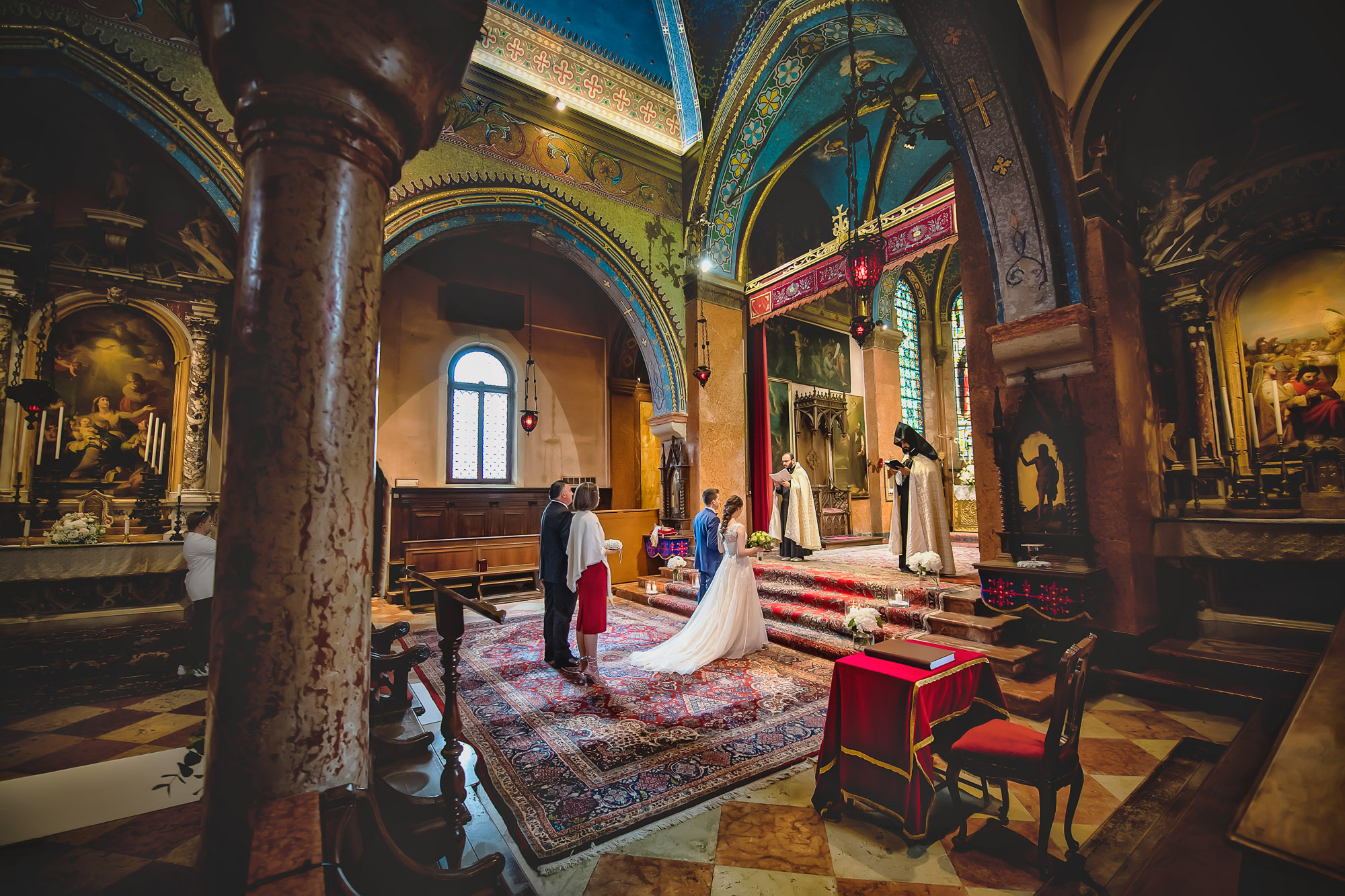 Venice church, Catholic liturgical wedding ceremony with bride and groom exchanging vows.