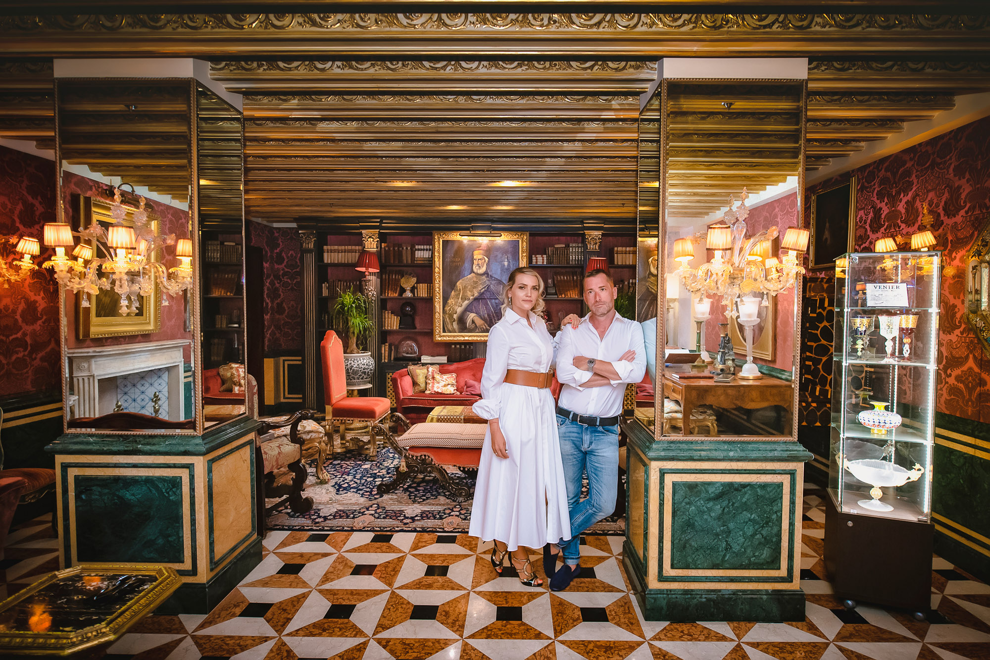 honeymoon couple portrait inside Gritti Palace library Venice