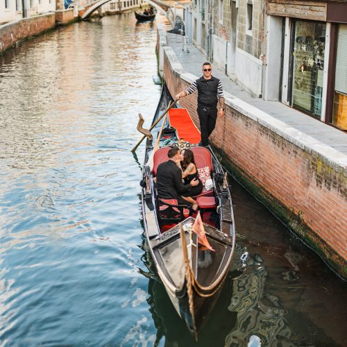 Surprise proposal captured during gondola ride in Venice