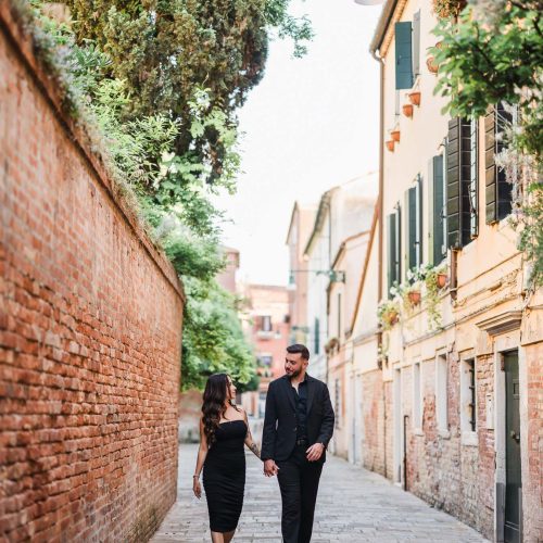 Intimate moment in a hidden street of Venice